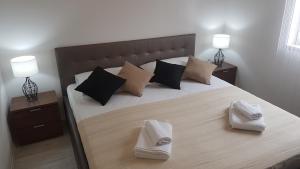 Postel nebo postele na pokoji v ubytování Apartment Azaleja
