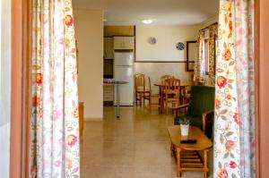 Kuchyň nebo kuchyňský kout v ubytování Apartamentos Tesy