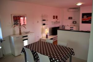 Kuchyň nebo kuchyňský kout v ubytování Aurelia Apartment