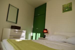 Postel nebo postele na pokoji v ubytování Aurelia Apartment