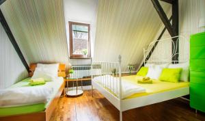 Postel nebo postele na pokoji v ubytování Hostel Centar