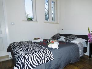 Кровать или кровати в номере Villa Astra