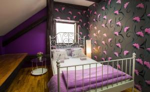 Postel nebo postele na pokoji v ubytování Hostel Centar