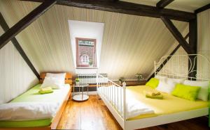 Postel nebo postele na pokoji v ubytování Hostel Centar
