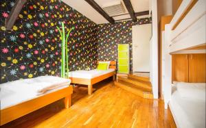 Postel nebo postele na pokoji v ubytování Hostel Centar