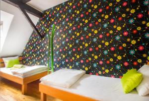 Postel nebo postele na pokoji v ubytování Hostel Centar