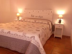 Voodi või voodid majutusasutuse Casa de Torla toas