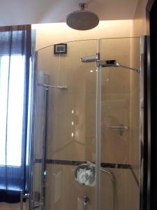 Koupelna v ubytování Hotel Excelsior
