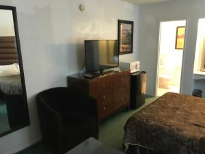 Letto o letti in una camera di Discovery Inn