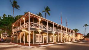 a building with lights on the side of a street at Best Western Pioneer Inn in Lahaina