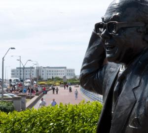a statue of a man wearing glasses at Midland Hotel in Morecambe