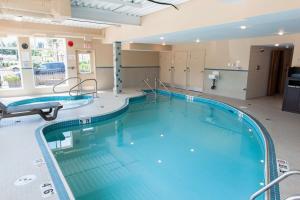 a large swimming pool in a large room at Best Western Maple Ridge in Maple Ridge