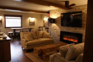 Кът за сядане в Boarders Inn & Suites by Cobblestone Hotels - Syracuse