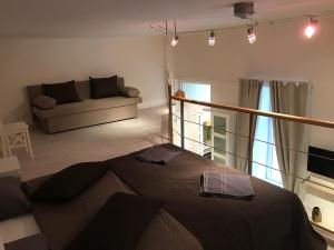Posteľ alebo postele v izbe v ubytovaní Goldcentral Gozsdu Apartment-Downtown Prime Location