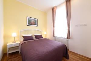 Cama o camas de una habitación en Zagreb 3 Hearts