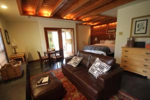 a living room with a couch and a bed at Sonoma Coast Villa in Bodega