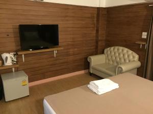 En tv och/eller ett underhållningssystem på Sudyod Apartment