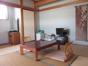 TV a/nebo společenská místnost v ubytování Shiunso