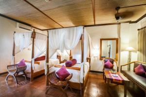 Voodi või voodid majutusasutuse Junjungan Ubud Hotel and Spa toas