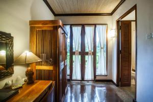 Voodi või voodid majutusasutuse Junjungan Ubud Hotel and Spa toas