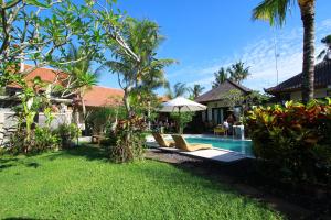 Bazén v ubytování Baliwid Villa Ubud nebo v jeho okolí