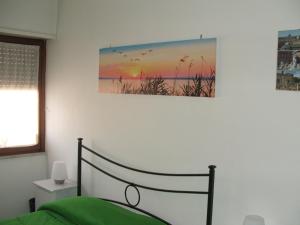 A bed or beds in a room at B&B La Cubanina