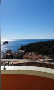 a view of the ocean from the roof of a building at Oro Apartments in Petrovac na Moru