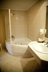 Ett badrum på Hotel Kaype - Quintamar