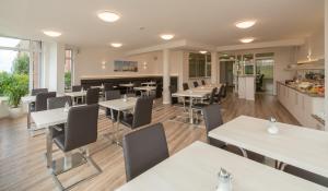 Kuchyň nebo kuchyňský kout v ubytování Hotel Chrisma