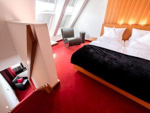 Ein Bett oder Betten in einem Zimmer der Unterkunft Hotel Antoniushütte