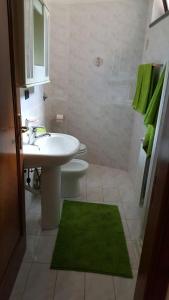 Koupelna v ubytování A Casa Di Melo + 12 fotografií