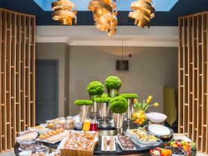 a table with a buffet of food on it at Midlands Park Hotel in Portlaoise