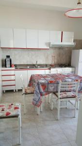 Kuchyň nebo kuchyňský kout v ubytování A Casa Di Melo