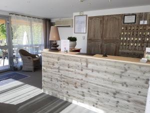 Posezení v ubytování Hôtel Le Mozart