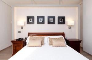 Postel nebo postele na pokoji v ubytování Hotel Villamadrid