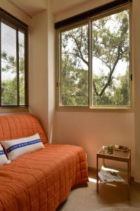 En eller flere senger på et rom på Ziv Apartments - Malkei Israel 6 A