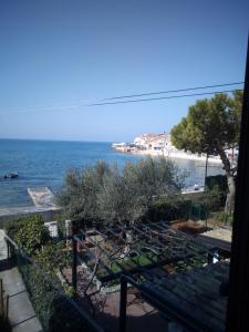 a view of the ocean from a balcony at Apartment Nonna Maria in Umag