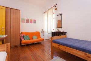 En eller flere senge i et værelse på Apartment Bing- city center