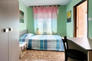 Postel nebo postele na pokoji v ubytování Albergo Mancuso del Voison