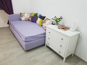 A bed or beds in a room at Suite Luisa Roma