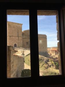 a view from a window of a castle at El Pajar del Castillo in Mora de Rubielos