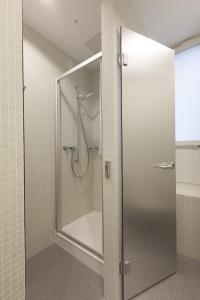 Koupelna v ubytování Hotel Alpha