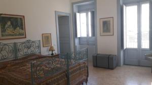 Postel nebo postele na pokoji v ubytování Casa Maltese ri Scicli