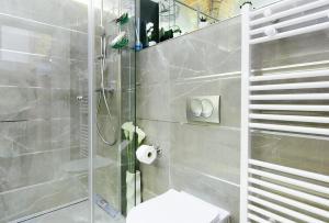 Kúpeľňa v ubytovaní Dalti Center Apartment