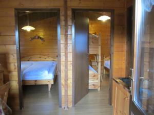 Postel nebo postele na pokoji v ubytování Camping Val di Sole