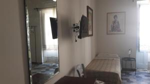 TV a/nebo společenská místnost v ubytování Casa Maltese ri Scicli