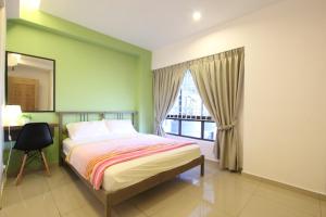 Cama o camas de una habitación en Vista Horizon Melaka