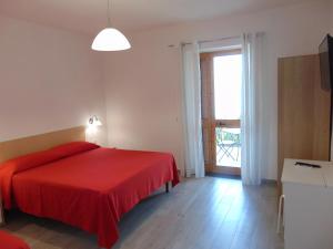 Postel nebo postele na pokoji v ubytování Vista Mare B&B