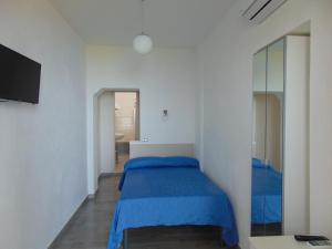TV a/nebo společenská místnost v ubytování Vista Mare B&B