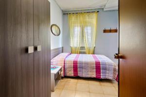 Postel nebo postele na pokoji v ubytování Albergo Mancuso del Voison